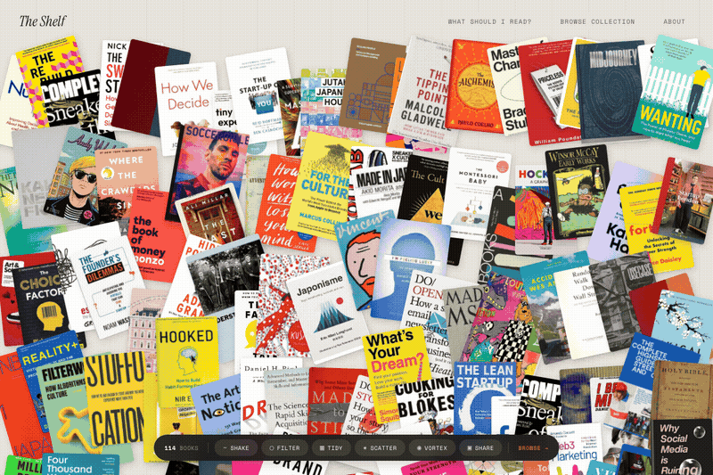 200+ book covers scattering outward and springing back on The Visible Shelf homepage